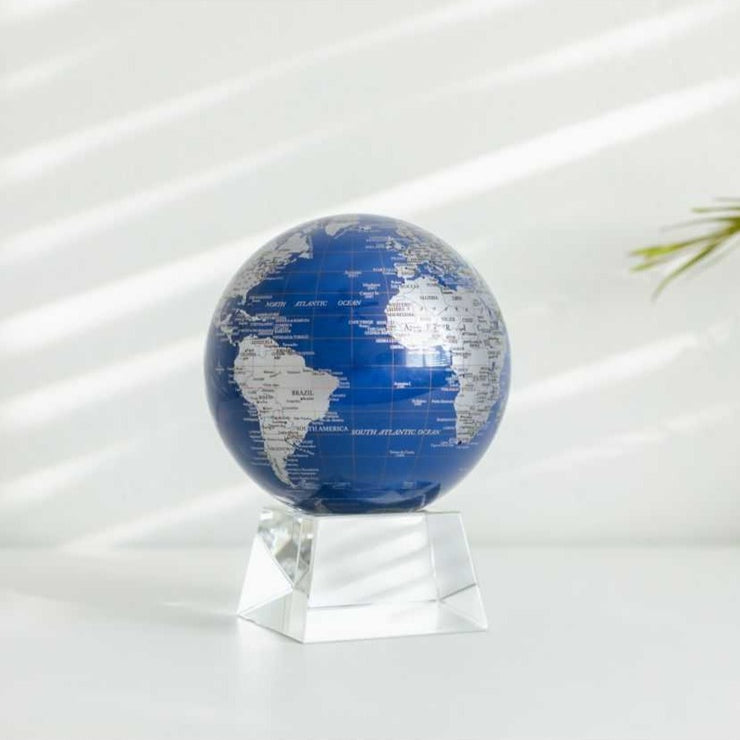 4.5" Blue & Silver World Map Spinning MOVA Globe with Acrylic Base. Powered by Ambient Light & Magnets. No cords or batteries needed. Shop online or in-store today!