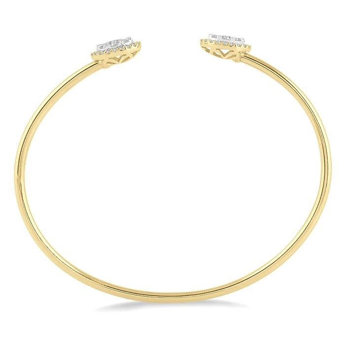 14K Yellow Gold 0.60ct Lovebright Oval Shape Diamond Flexible Open Cuff Bangle Bracelet. Bichsel Jewelry in Sedalia, MO. Shop online or in-store today!