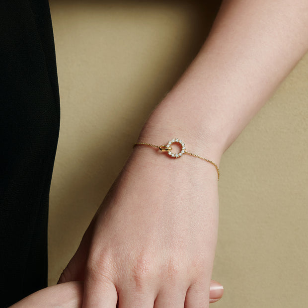Ania Haie Interlinked Circles Pavé Bracelet. 14K Yellow Gold plated on 925 Sterling Silver with CZ stones. Bichsel Jewelry in Sedalia, MO. Shop online or in-store today!