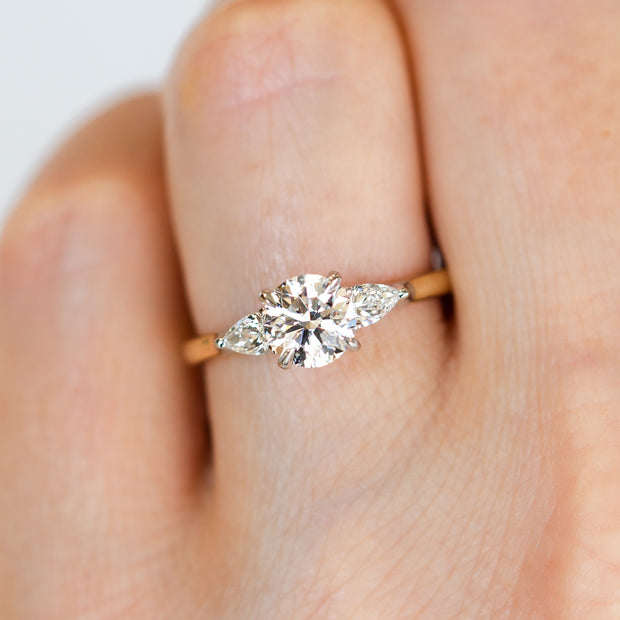 Round & Pear Diamond Three-Stone Engagement Ring