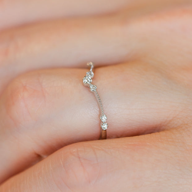 14K White Gold Dainty V-Shape 7-Stone Round Diamond Accent Band. Bichsel Jewelry in Sedalia, MO. Shop stackable rings & wedding bands online or in-store!