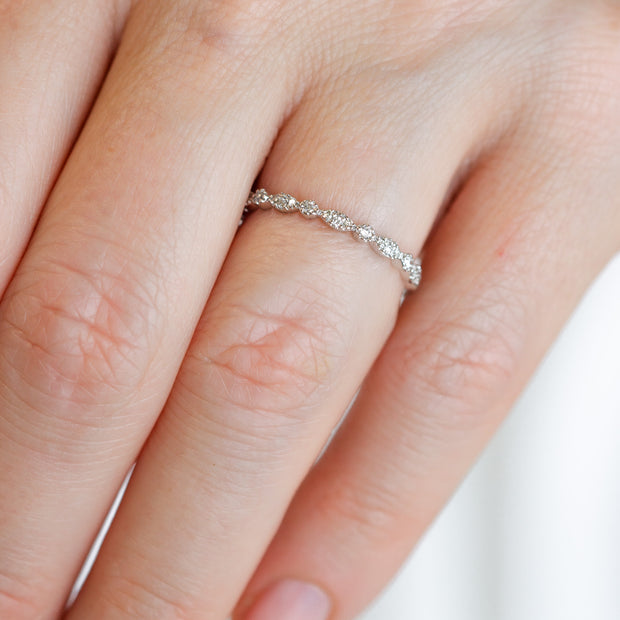 14K White Gold Dainty Marquise & Round Shape Diamond Cluster Band. Bichsel Jewelry in Sedalia, MO. Shop stackable rings and wedding bands online or in-store today!