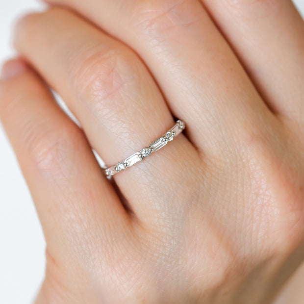 14K White Gold 0.35ct Single Prong Alternating Baguette & Round Diamond Band. Bichsel Jewelry in Sedalia, MO. Shop stackable rings and wedding bands online or in-store.