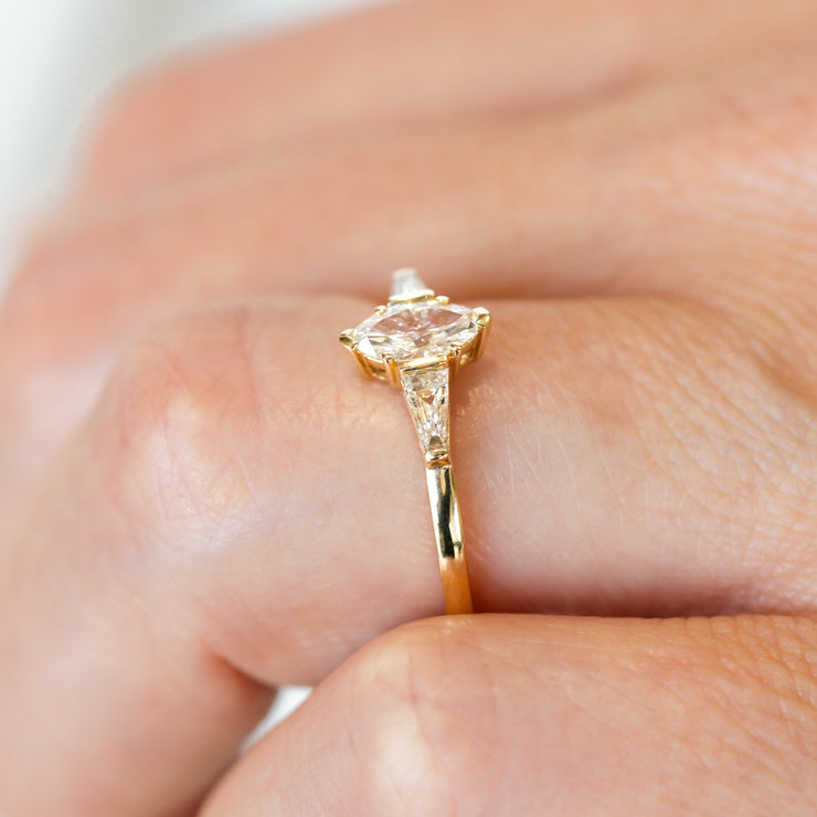 14K Yellow Gold 0.38ct Marquise Diamond Engagement Ring with 0.26ct Baguette Accent Side Stones. Bichsel Jewelry in Sedalia, MO. Shop ring styles online or in-store today!