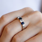 14K White Gold 1.98ct Five-Stone Alternating Oval Sapphire & Diamond Ring. Bichsel Jewelry in Sedalia, MO. Shop gemstone rings online or in-store!