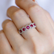 14K White Gold 1.82ct Five-Stone Ruby Band with Round Diamond Halos. Bichsel Jewelry in Sedalia, MO. Shop gemstone rings online or in-store!