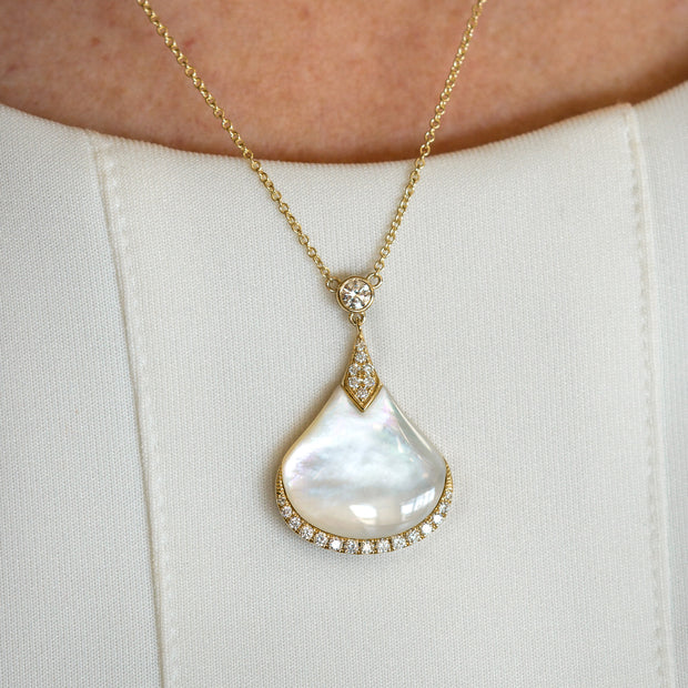 14K Yellow Gold 7.20ct Mother of Pearl Diamond Drop Pendant. Bichsel Jewelry in Sedalia, MO. Shop pearl styles online or in-store today!