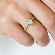 14K Yellow Gold 0.64ct Oval Opal Ring with 0.11ct Scalloped Diamond Band, Size 7. Bichsel Jewelry in Sedalia, MO. Shop gemstone rings online or in-store today!
