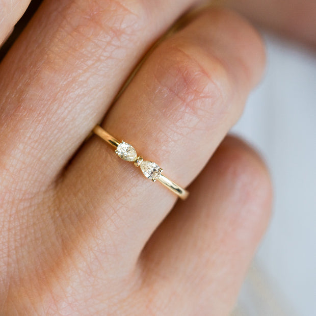 14K Yellow Gold Diamond Bow Ring with Pear Shape 0.20ct Diamonds. Bichsel Jewelry in Sedalia, MO. Shop ring styles online or in-store today!