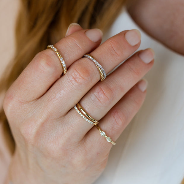 14K Yellow Gold Criss-Cross Ribbed Twist 0.36ct Stacked Round Diamond Ring. Bichsel Jewelry in Sedalia, MO. Shop ring styles online or in-store today!