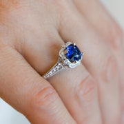14K White Gold Vintage-Inspired Round 1.82ct Sapphire Ring with Diamond Halo and Band, Milgrain Edge. Bichsel Jewelry in Sedalia, MO. Shop gemstone styles online or in-store!