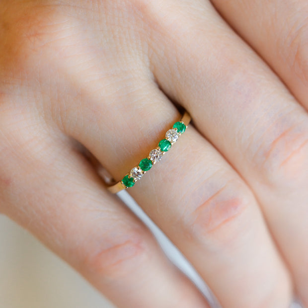 14K Yellow Gold Alternating Round 0.20ct Emerald & 0.16ct Diamond Stackable Ring. Bichsel Jewelry in Sedalia, MO. Shop gemstone styles online or in-store today!