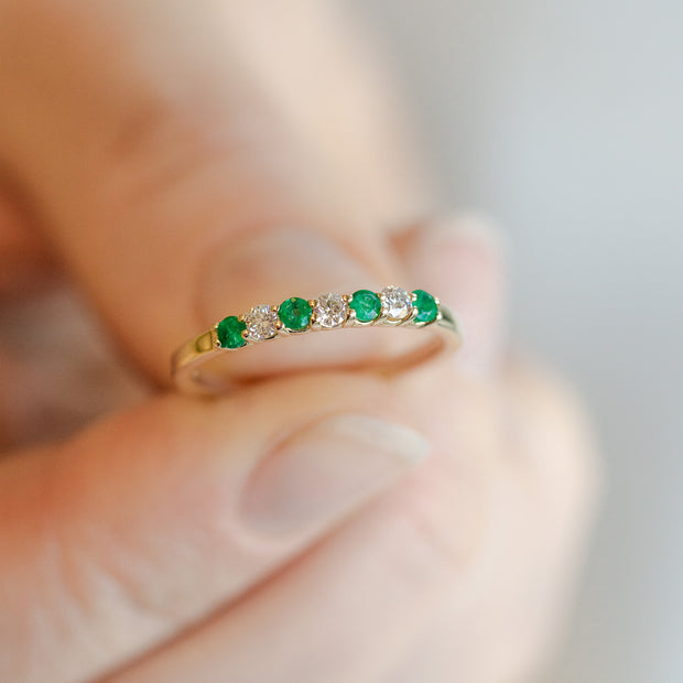 14K Yellow Gold Alternating Round 0.20ct Emerald & 0.16ct Diamond Stackable Ring. Bichsel Jewelry in Sedalia, MO. Shop gemstone styles online or in-store today!
