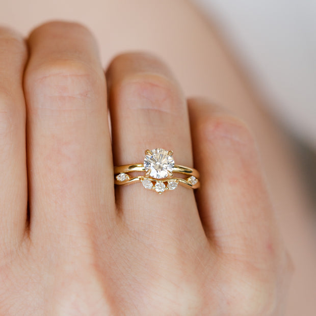 14K Yellow Gold Floral-Inspired Curved Diamond Vine Band with Round, Marquise Diamonds. Bichsel Jewelry in Sedalia, MO. Shop stackable rings and wedding bands online or in-store!