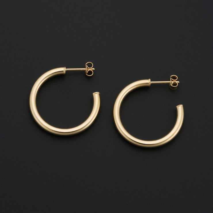 14K Yellow Gold 2.8x20mm Open Tube Hoop Earrings. Bichsel Jewelry in Sedalia, MO. Shop gold earrings online or in-store today!