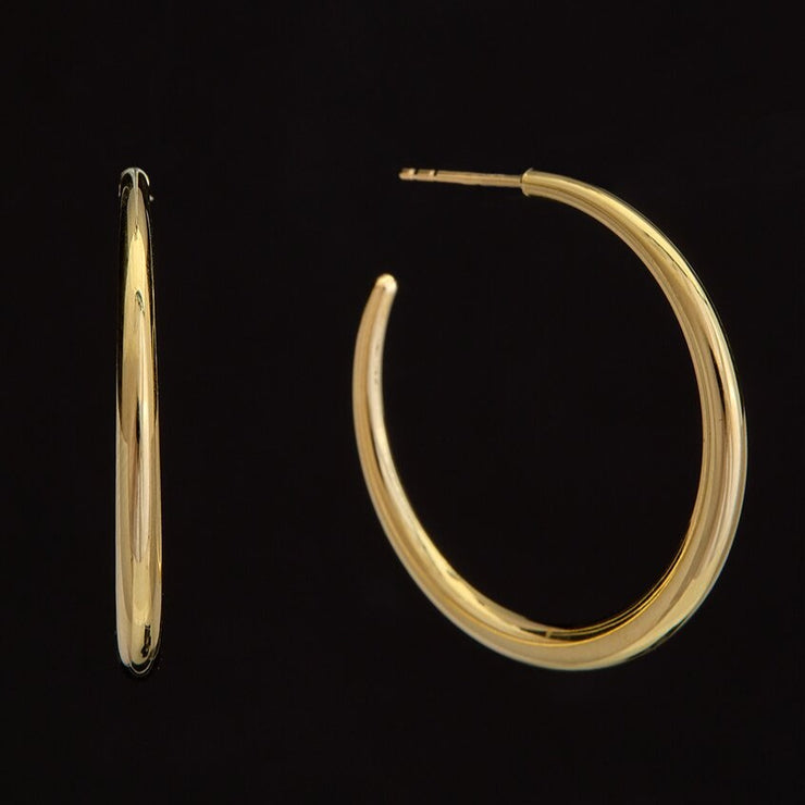 14K Yellow Gold 3x27.5mm Graduated Open Tube Hoop Earrings. Bichsel Jewelry in Sedalia, MO. Shop gold earrings online or in-store today!