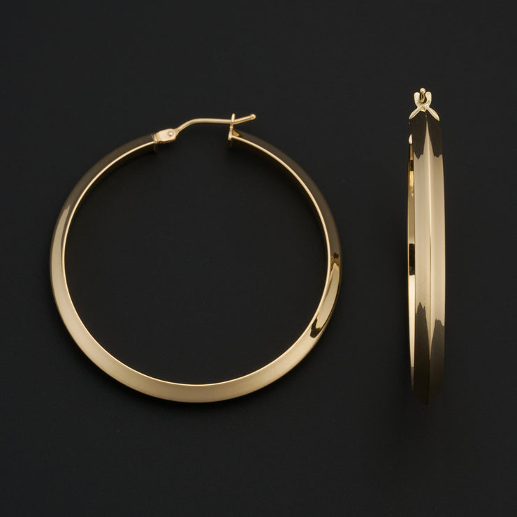 14K Yellow Gold 4x35mm Polished Knife Edge Hoop Earrings. Bichsel Jewelry in Sedalia, MO. Shop gold earrings online or in-store today!