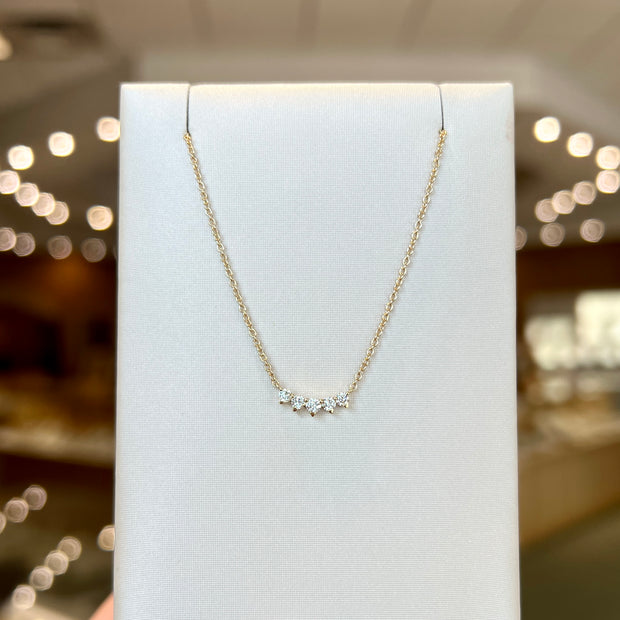 14K Yellow Gold 0.21ct Round Five-Diamond Curve Bar Pendant. Bichsel Jewelry in Sedalia, MO. Shop diamond styles online or in-store!