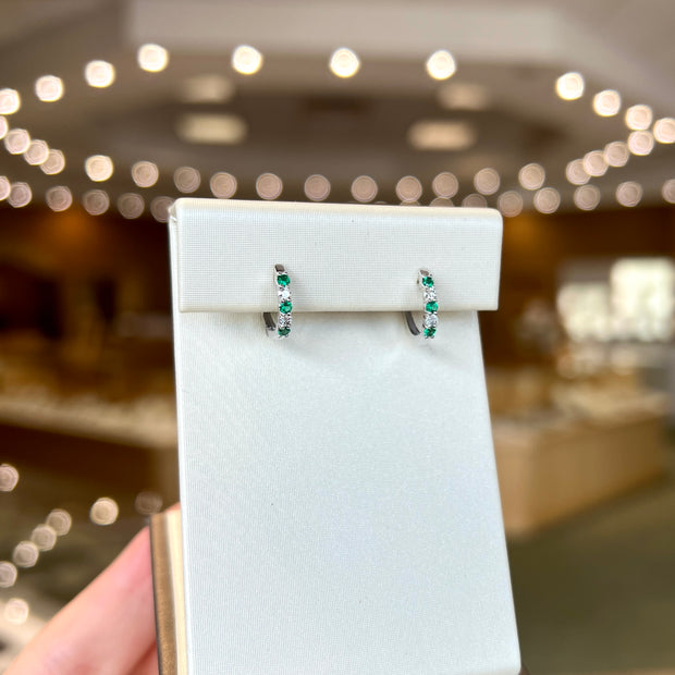 14K White Gold Alternating Round Emerald & Diamond Mini Hoop Earrings. Bichsel Jewelry in Sedalia, MO. Shop gemstone earrings online or in-store! 