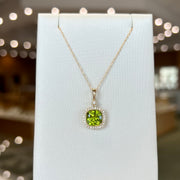 14K Yellow Gold 2.10ct Cushion Cut Peridot Necklace with Diamond Accent Halo & Milgrain Details. Bichsel Jewelry in Sedalia, MO. Shop gemstone styles online or in-store!