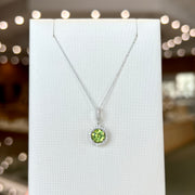 14K White Gold Round 0.95ct Peridot Necklace with Diamond Halo. Bichsel Jewelry in Sedalia, MO. Shop gemstone styles online or in-store!
