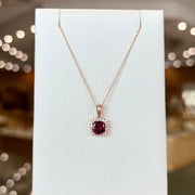 14K Rose Gold 1.20ct Cushion Cut Rhodolite Garnet Necklace with Diamond Halo. Bichsel Jewelry in Sedalia, MO. Shop gemstone styles online or in-store!
