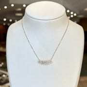 14K Yellow Gold 0.71ct Curved Three Row Round & Baguette Lab Grown Diamond Pendant. Bichsel Jewelry in Sedalia, MO. Shop diamond jewelry online or in-store today!