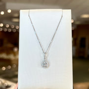 14K White Gold 0.70ct Pear Shape Lab Grown Diamond Halo Necklace. Bichsel Jewelry in Sedalia, MO. Shop online or in-store today!