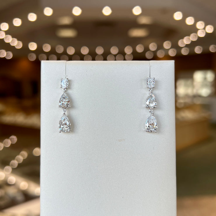 14K White Gold 3.35ct Oval & Pear Lab Grown Diamond Graduated Dangle Drop Earrings. Bichsel Jewelry in Sedalia, MO. Shop online or in-store today!