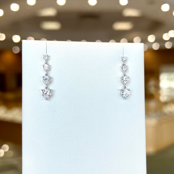 14K White Gold 1.31ct Round Lab Grown Diamond Graduated Dangle Drop Earrings. Bichsel Jewelry in Sedalia, MO. Shop online or in-store today!