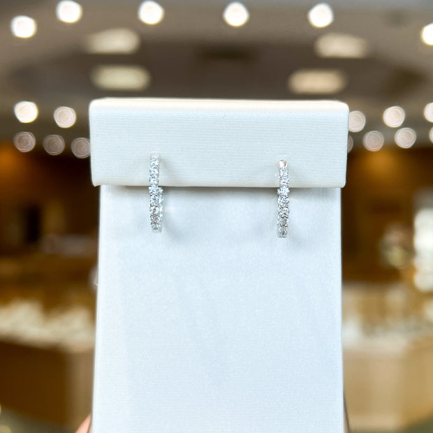 14K White Gold Round 0.53ct Lab Grown Diamond Inside-Out Huggie Hoop Earrings. Bichsel Jewelry in Sedalia, MO. Shop online or in-store!