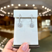 14K White Gold Lab Grown Diamond Huggie Hoop Earrings with 1.24ct Pear Shape Halo Dangles. Bichsel Jewelry in Sedalia, MO. Shop online or in-store!