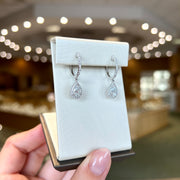 14K White Gold Lab Grown Diamond Huggie Hoop Earrings with 1.24ct Pear Shape Halo Dangles. Bichsel Jewelry in Sedalia, MO. Shop online or in-store!