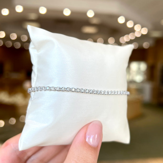 14K White Gold 1ct or 2ct Round Lab Grown Diamond Tennis Bracelet. Bichsel Jewelry in Sedalia, MO. Shop diamond styles online or in-store today!