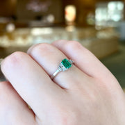 14K White Gold Art Deco-Inspired 0.55ct Emerald Ring with Baguette Bezel-Set Accent Diamonds. Bichsel Jewelry in Sedalia, MO. Shop online or in-store today!