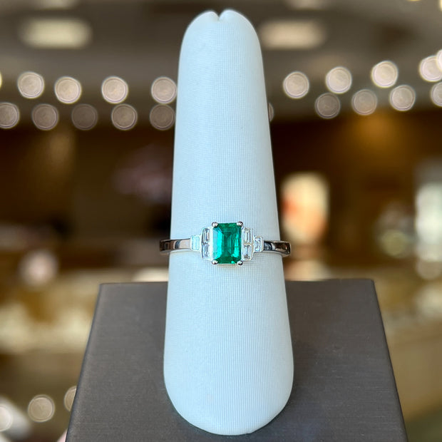 14K White Gold Art Deco-Inspired 0.55ct Emerald Ring with Baguette Bezel-Set Accent Diamonds. Bichsel Jewelry in Sedalia, MO. Shop online or in-store today!