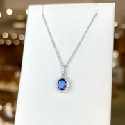 14K White Gold Oval 1.30ct Tanzanite Necklace with Diamond Halo & Bail. Bichsel Jewelry in Sedalia, MO. Shop gemstone styles online or in-store today!