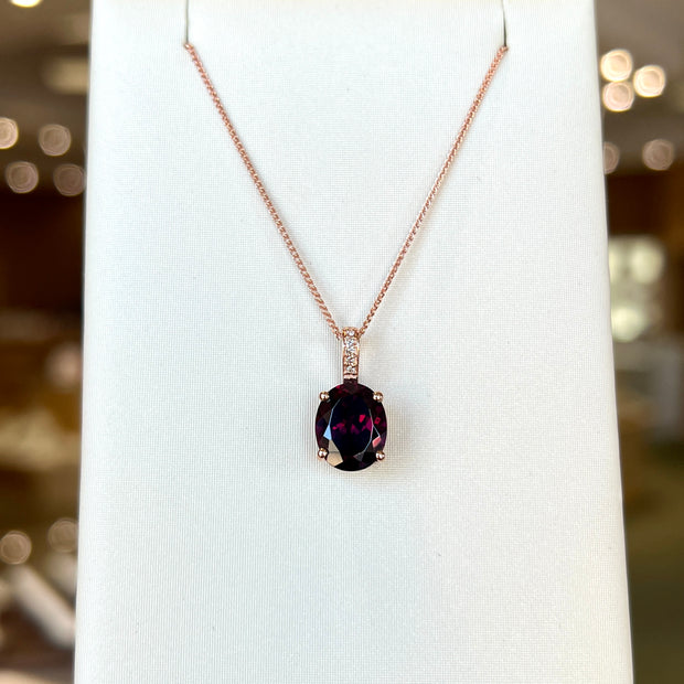 14K Rose Gold Rhodolite Garnet Necklace with Diamond-Accented Bail. Bichsel Jewelry in Sedalia, MO. Shop online or in-store today!