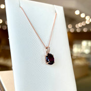 14K Rose Gold Rhodolite Garnet Necklace with Diamond-Accented Bail. Bichsel Jewelry in Sedalia, MO. Shop online or in-store today!