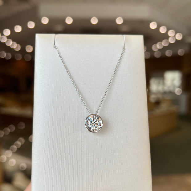 14K White Gold 2.17ct Round Lab Grown Diamond Bezel-Set Solitaire Necklace. Bichsel Jewelry in Sedalia, MO. Shop diamond styles online or in-store today!