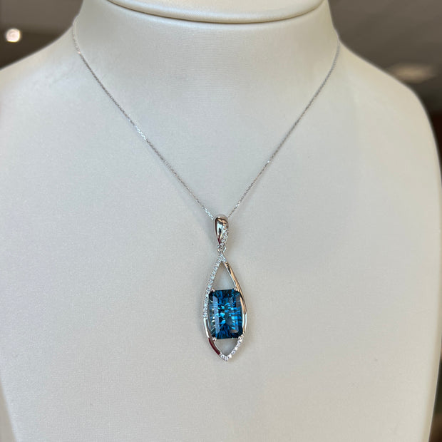 14K White Gold 4.70ct Radiant Fantasy Cut London Blue Topaz Pendant with Diamond Accents. Bichsel Jewelry in Sedalia, MO. Shop gemstone rings online or in-store today!