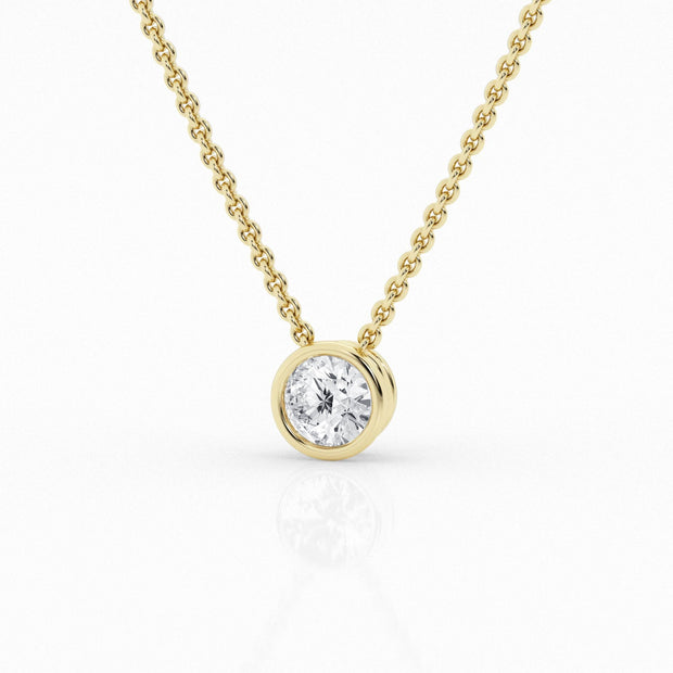 14K Yellow Gold 0.50ct Round Lab Grown Diamond Bezel Solitaire Pendant. Bichsel Jewelry in Sedalia, MO. Shop diamond jewelry online or in-store!
