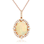 14K Rose Gold 3.00ct Opal Pendant with Diamond Halo & Bail. Bichsel Jewelry in Sedalia, MO. Shop opal gem styles online or in-store today! 