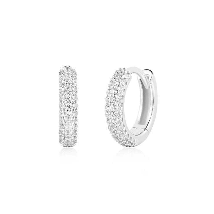 Ania Haie Reversible Silver Pavé Huggie Hoop Earrings. 925 sterling silver with CZ stones. Bichsel Jewelry in Sedalia, MO. Shop earring styles online or in-store today! 