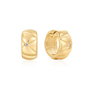 Ania Haie Gold Quilted Puff Huggie Hoop Earrings. 14K yellow gold plated on sterling silver with CZ stones. Bichsel Jewelry in Sedalia, MO. Shop online or in-store today!