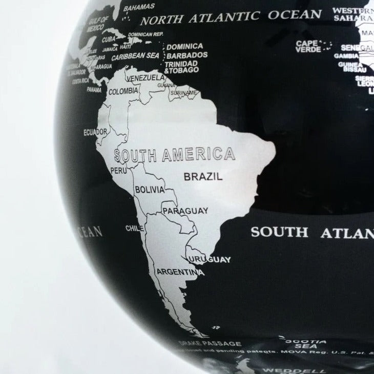 4.5" Black & Silver Spinning MOVA World Map Globe with Acrylic Base. Powered by Ambient Light & Magnets. No cords or batteries needed. Shop online or in-store today!